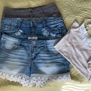 Bundle of four items three shorts and one tank all fit size medium or 7 to 9